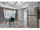 Eat-in kitchen with stainless steel appliances and backyard view at 4773 Sarazen Cir, Las Vegas, NV 89103