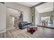 Open concept living area with a staircase and hardwood floors at 4773 Sarazen Cir, Las Vegas, NV 89103
