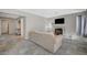 Living room with fireplace and view into kitchen area at 4773 Sarazen Cir, Las Vegas, NV 89103