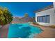Inviting backyard swimming pool with surrounding patio at 4773 Sarazen Cir, Las Vegas, NV 89103