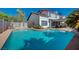 Large inviting pool with a spacious backyard at 4773 Sarazen Cir, Las Vegas, NV 89103