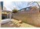 Private backyard with a covered patio and a tall block wall for added seclusion at 523 Painted Cloud Pl, Las Vegas, NV 89144