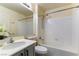 Cozy bathroom with combined tub and shower and a classic vanity at 523 Painted Cloud Pl, Las Vegas, NV 89144