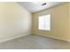 Inviting bedroom with light wood-look floors, natural light, and neutral walls at 523 Painted Cloud Pl, Las Vegas, NV 89144