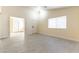 Bright, vacant living room featuring modern, light-toned flooring and ample natural light at 523 Painted Cloud Pl, Las Vegas, NV 89144