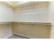 Spacious walk-in closet with ample shelving and hanging space for organized storage at 523 Painted Cloud Pl, Las Vegas, NV 89144