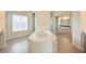 Large bathroom with soaking tub and shower at 6412 Moss Agate Dr, Las Vegas, NV 89131