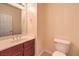 Clean bathroom with updated vanity and toilet at 6412 Moss Agate Dr, Las Vegas, NV 89131