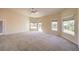 Main bedroom with backyard views and ceiling fan at 6412 Moss Agate Dr, Las Vegas, NV 89131