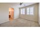 Spacious bedroom with double windows and en-suite bathroom at 6412 Moss Agate Dr, Las Vegas, NV 89131