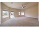 Spacious bedroom with multiple windows and carpet at 6412 Moss Agate Dr, Las Vegas, NV 89131