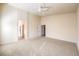 Large bedroom with plush carpet and access to hallway at 6412 Moss Agate Dr, Las Vegas, NV 89131