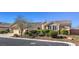 Single-story house with landscaped yard and two-car garage at 6412 Moss Agate Dr, Las Vegas, NV 89131