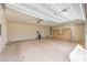 Two-car garage with opener, built-in cabinets, and ample space at 6412 Moss Agate Dr, Las Vegas, NV 89131