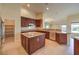 Kitchen with island, granite, and stainless steel appliances at 6412 Moss Agate Dr, Las Vegas, NV 89131