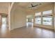 Bright and airy living room with high ceilings and ceiling fan at 6412 Moss Agate Dr, Las Vegas, NV 89131
