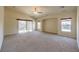 Bright and airy living room with sliding glass doors at 6412 Moss Agate Dr, Las Vegas, NV 89131