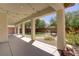 Spacious covered patio with string lights overlooks the xeriscaped backyard at 8005 Egypt Meadows Ave, Las Vegas, NV 89178