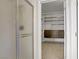 Bathroom shower and walk-in closet with custom shelving at 8005 Egypt Meadows Ave, Las Vegas, NV 89178