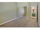 Bedroom featuring carpet, mirror closet, and ensuite bathroom at 8005 Egypt Meadows Ave, Las Vegas, NV 89178