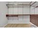 Spacious walk-in closet with custom shelving and drawers for organized storage at 8005 Egypt Meadows Ave, Las Vegas, NV 89178