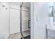 Clean bathroom with a glass shower and grey flooring at 10658 Salmon Leap St, Las Vegas, NV 89183