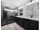 Spa-like bathroom with double vanity, large shower, and modern fixtures at 10658 Salmon Leap St, Las Vegas, NV 89183