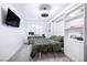 Bedroom with a wall bed, desk, and plenty of storage at 10658 Salmon Leap St, Las Vegas, NV 89183