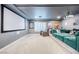 Spacious home theater with projector, large screen, and comfortable seating at 10658 Salmon Leap St, Las Vegas, NV 89183