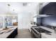 Modern kitchen with stainless steel appliances and marble island at 10658 Salmon Leap St, Las Vegas, NV 89183