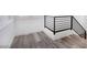 Stylish staircase with metal railing and grey carpeting at 10658 Salmon Leap St, Las Vegas, NV 89183