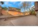 Spacious backyard with brick pavers and a low retaining wall at 11740 Via Esperanza Ave, Las Vegas, NV 89138