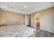 Spacious Primary bedroom with large window and en-suite bathroom at 11740 Via Esperanza Ave, Las Vegas, NV 89138