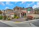 Two-story house with landscaped yard and attached garage at 11740 Via Esperanza Ave, Las Vegas, NV 89138