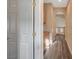 Upstairs hallway with built-in shelves and laminate flooring at 11740 Via Esperanza Ave, Las Vegas, NV 89138