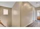 Upstairs hallway with light walls and wood-look flooring at 11740 Via Esperanza Ave, Las Vegas, NV 89138