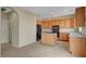 Modern kitchen with island and stainless steel appliances at 11740 Via Esperanza Ave, Las Vegas, NV 89138