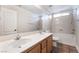 Bathroom boasts double sinks, a bathtub and tile flooring at 126 Cricklewood Ave, Henderson, NV 89002