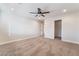 Spacious bedroom with ceiling fan and neutral colored carpet, and closet at 126 Cricklewood Ave, Henderson, NV 89002