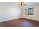 Bright bedroom with ceiling fan and hardwood floors at 126 Cricklewood Ave, Henderson, NV 89002