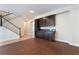 Modern kitchen with dark wood cabinets and granite countertops at 126 Cricklewood Ave, Henderson, NV 89002