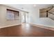 Open living room with hardwood floors and a staircase at 126 Cricklewood Ave, Henderson, NV 89002