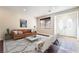 Bright living room featuring a comfortable sofa and stylish decor at 126 Cricklewood Ave, Henderson, NV 89002