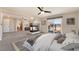 Main bedroom with fireplace, private balcony, and ceiling fan at 126 Cricklewood Ave, Henderson, NV 89002