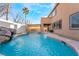 Relaxing freeform pool with rock waterfall feature at 126 Cricklewood Ave, Henderson, NV 89002