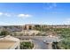 Balcony with city and desert landscape view, including palm trees and hotel buildings at 145 E Harmon Ave # 402, Las Vegas, NV 89109