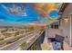 Relaxing balcony with stunning sunset and rainbow views at 176 Kimberlite Dr, Henderson, NV 89011