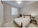 Cozy bedroom featuring a queen-size bed and charming decor at 176 Kimberlite Dr, Henderson, NV 89011