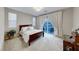 Spacious bedroom with a comfortable bed and private balcony access at 176 Kimberlite Dr, Henderson, NV 89011