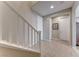 View of entryway with staircase and tile flooring at 176 Kimberlite Dr, Henderson, NV 89011